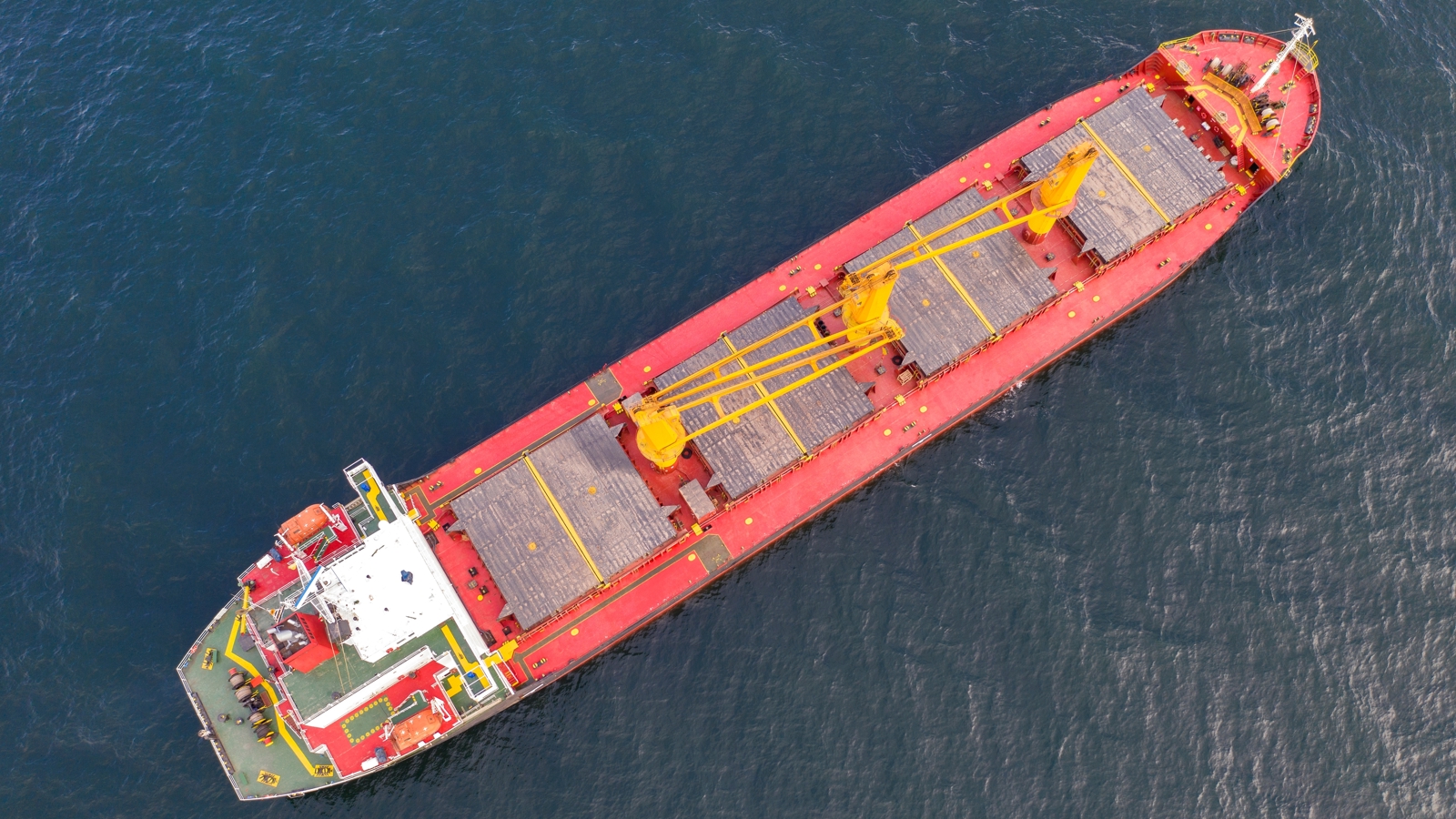 Aerial view of cargo ship shutterstock_2284507453 Aerial view of cargo ship shutterstock_2284507453