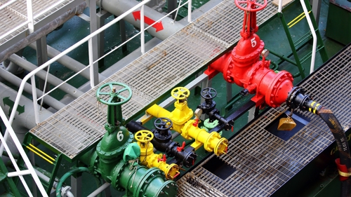 valves on fueling ship shutterstock_392749129