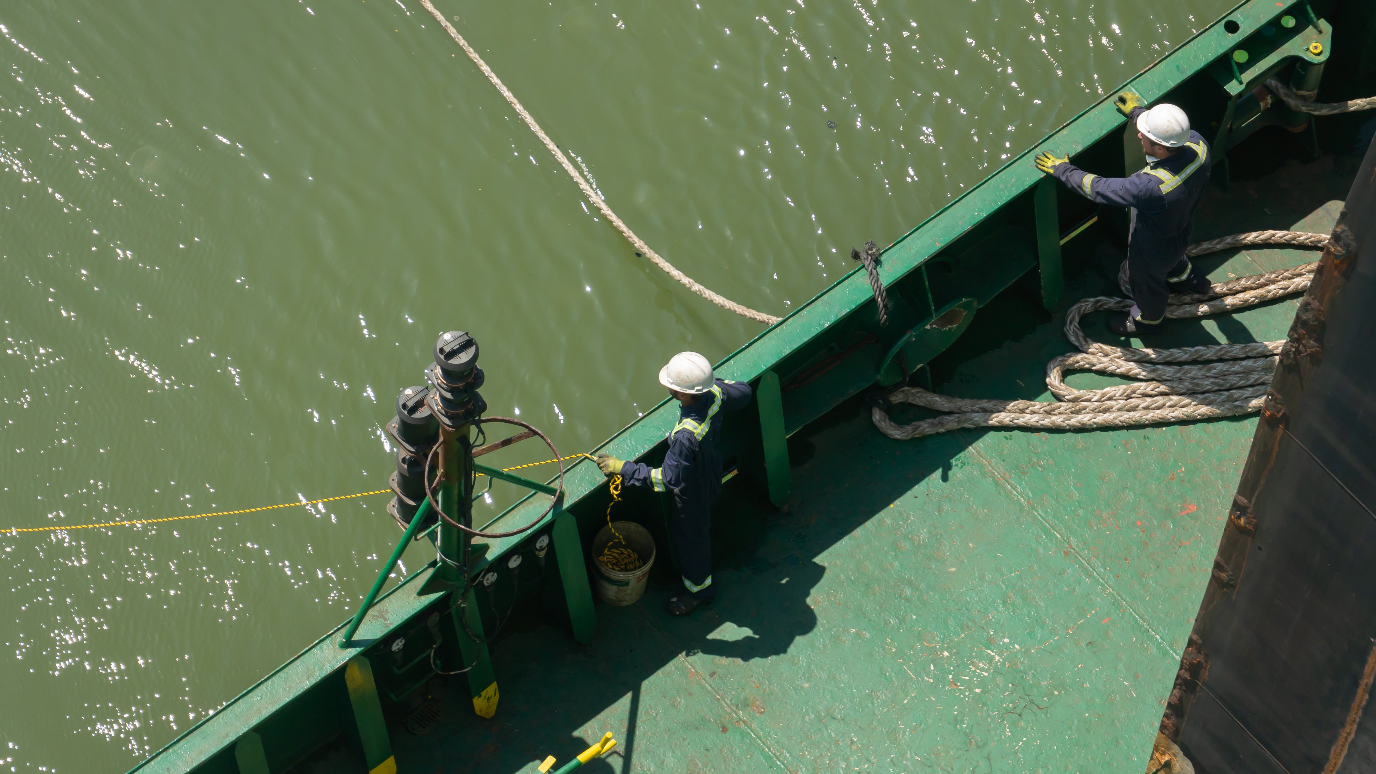 Crew is looking at mooring lines