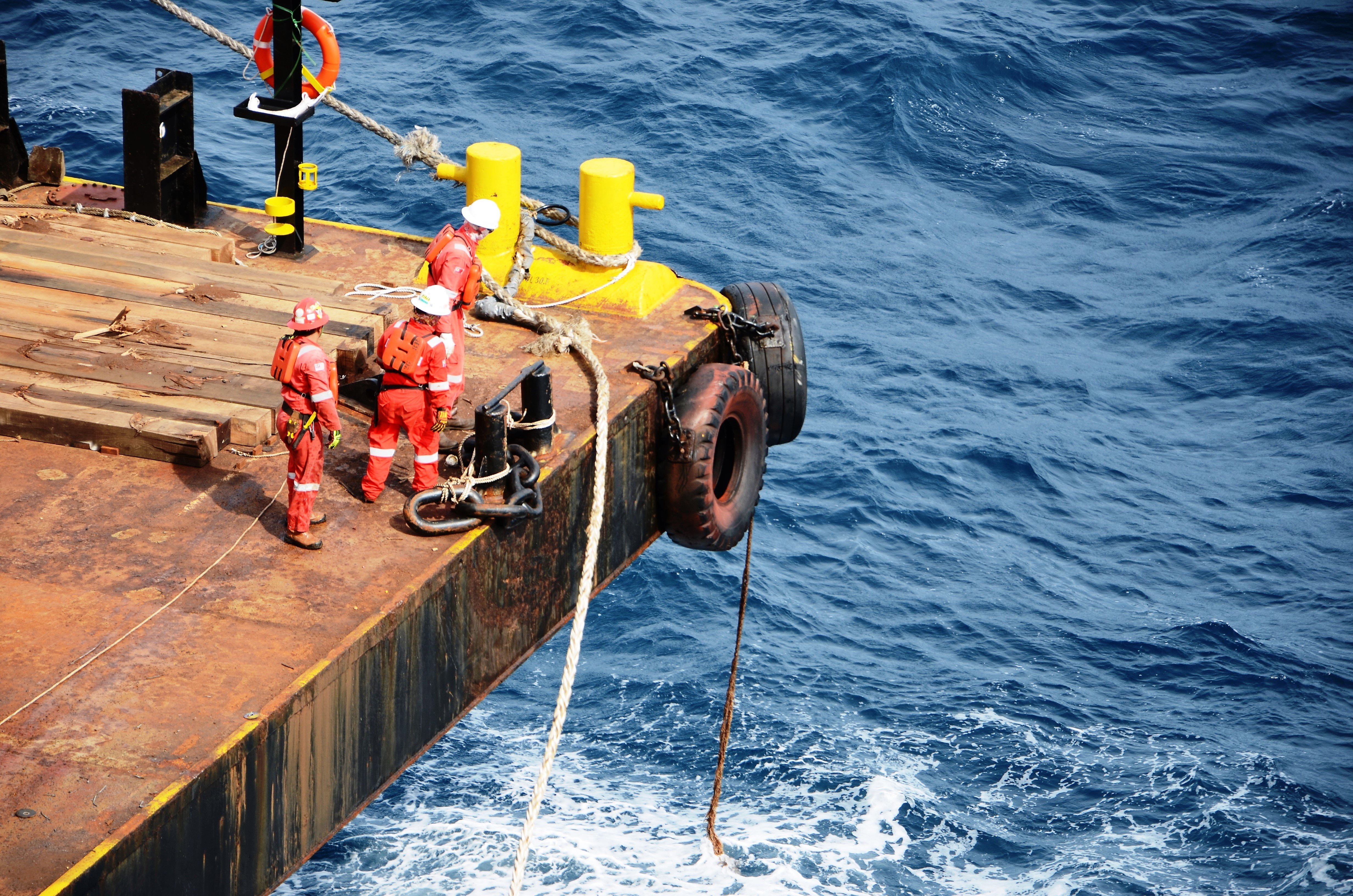 Crew working on mooring ropes
