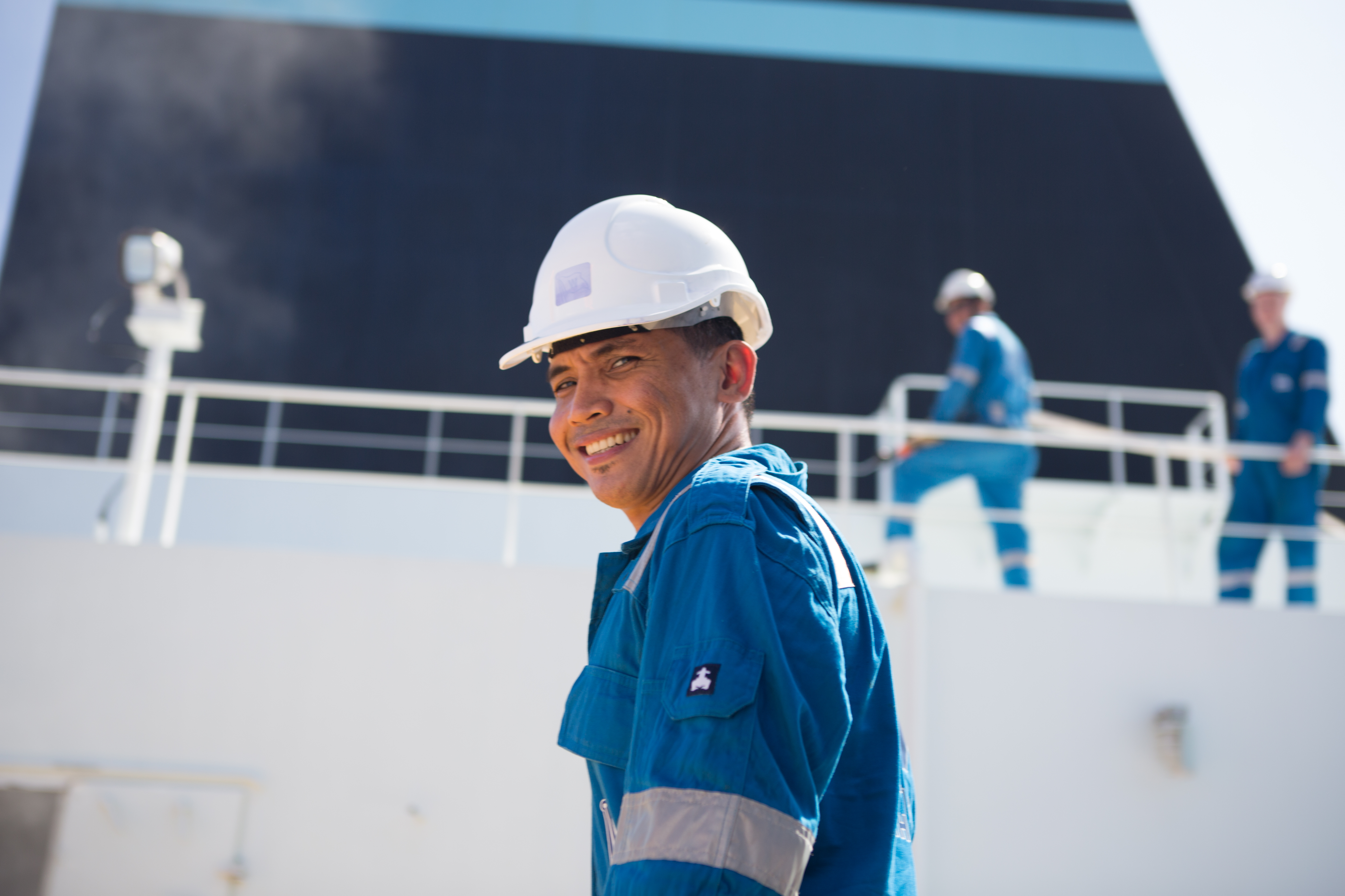 seafarer turns and smiles