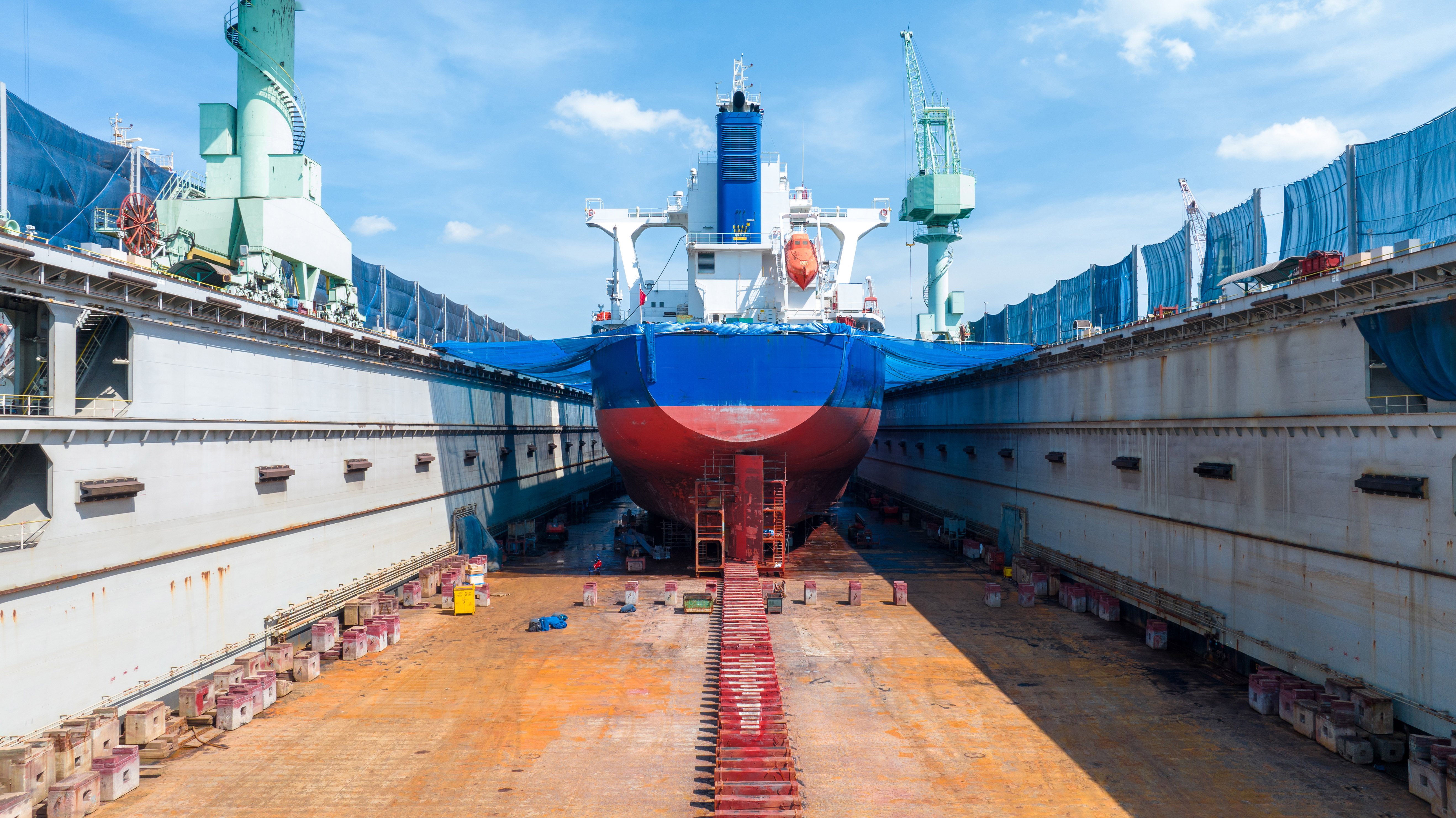 Container vessel in dry dock for safe and efficient operations.